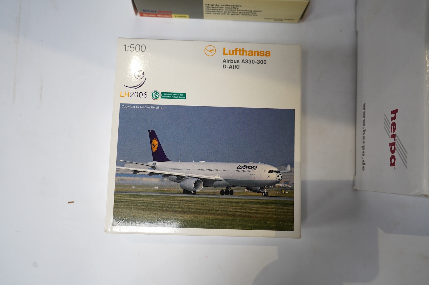 Twenty-four boxed models of modern passenger aircraft by Herpa, Schuco Star Jets, etc. in a mainly 1:500 scale and including three aircraft in 1:200 scale, operators include Lufthansa, Emirates, BMI, Qantas, etc. Conditi